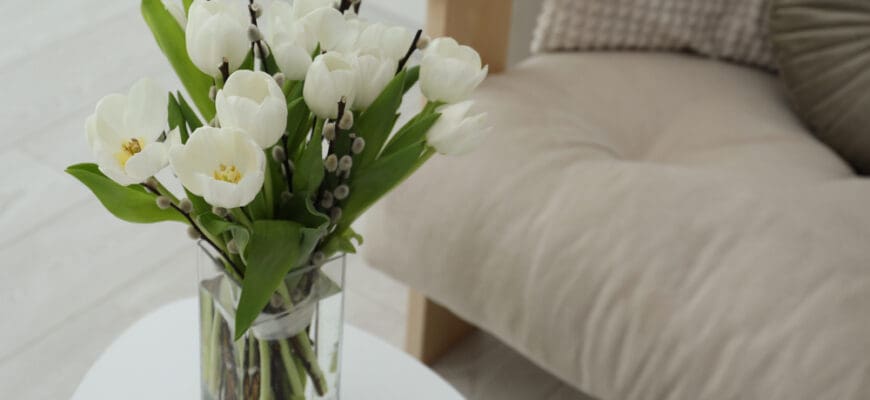 Beautiful,Bouquet,Of,Willow,Branches,And,Tulips,In,Vase,On